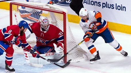 Canadiens goaltender Carey Price and defenseman Jordie Benn