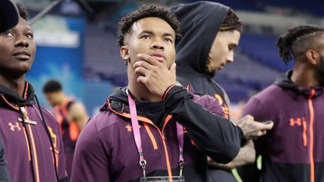 Oklahoma quarterback Kyler Murray watches drills at the