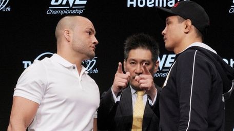Eddie Alvarez, left, of the United States and