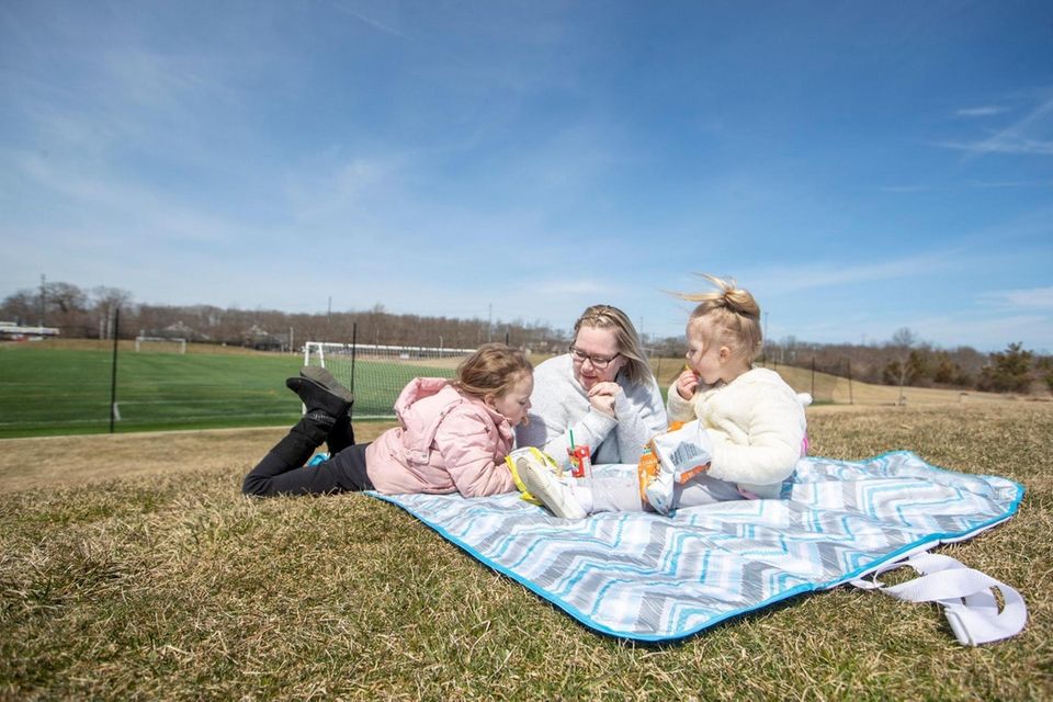 Collette Castiglione and her daughters Ava, 7, and