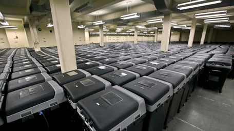 Rows and rows of electronic voting machines are