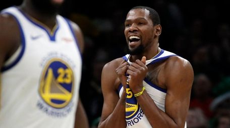 Warriors forward Kevin Durant celebrates against the Celtics