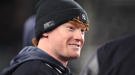 Yankees' Clint Frazier looks on in the dugout