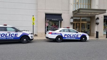 Suffolk police outside the Saks Fifth Avenue store