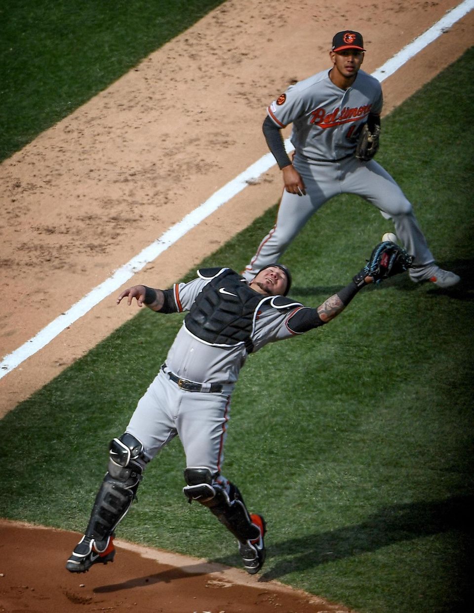 Baltimore Orioles catcher Jesus Sucre drops a pop