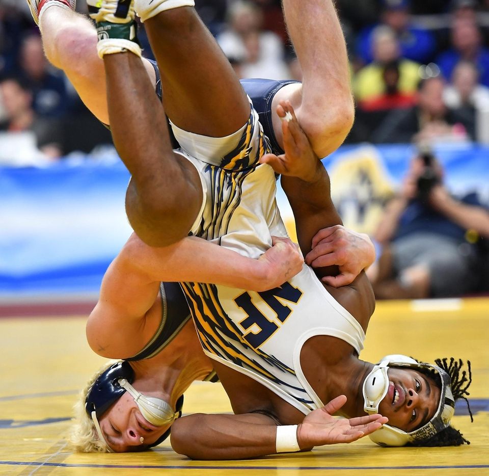 Adam Busiello, Eastport-South Manor pins his opponent and