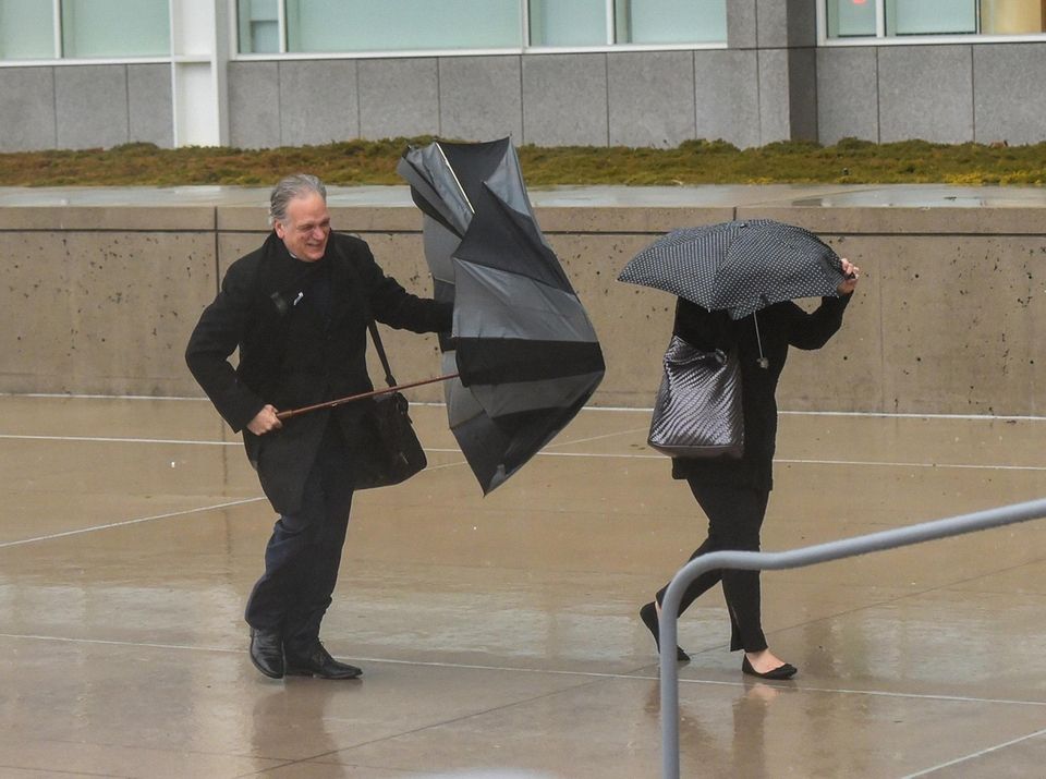 Ed and Linda Mangano arrive at federal court
