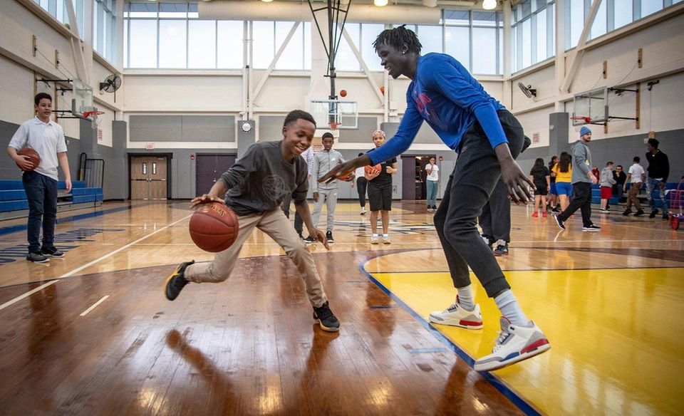 Long Island Nets player Nuni Omot facing off