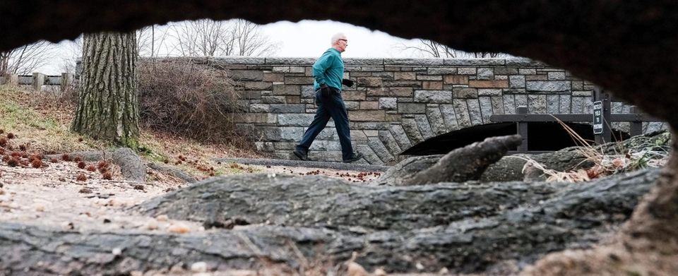 A man runs at Belmont Lake State Park