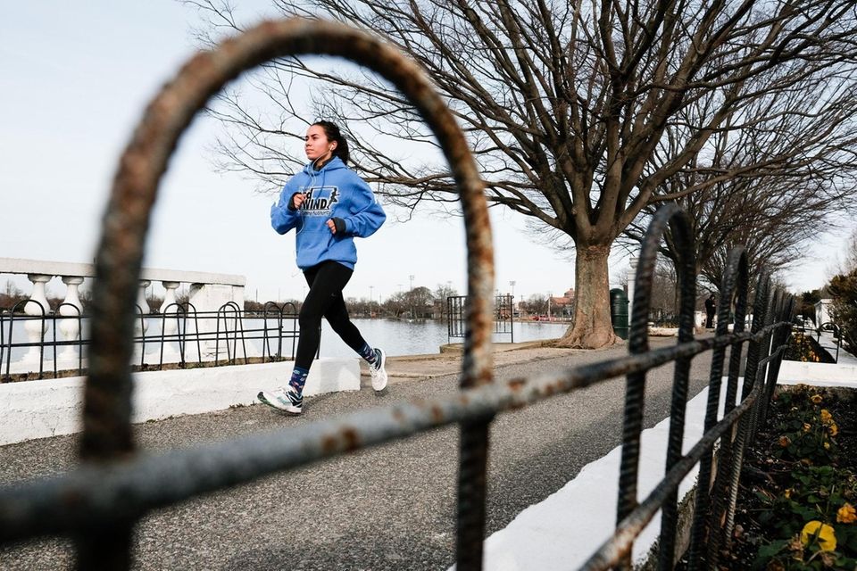Despite brisk conditions, a woman runs around Argyle