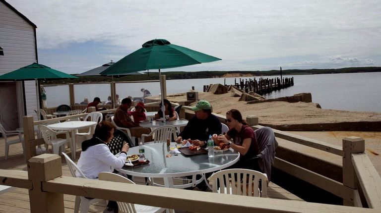 Diners eat at Duryea's Lobster Deck in Montauk
