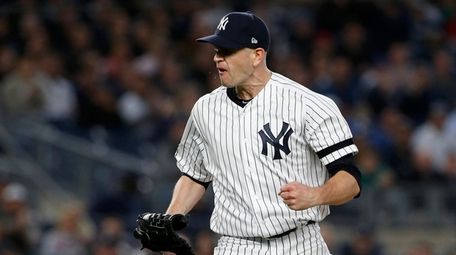 James Paxton #65 of the Yankees reacts after