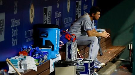 Mets starting pitcher Steven Matz sits in the