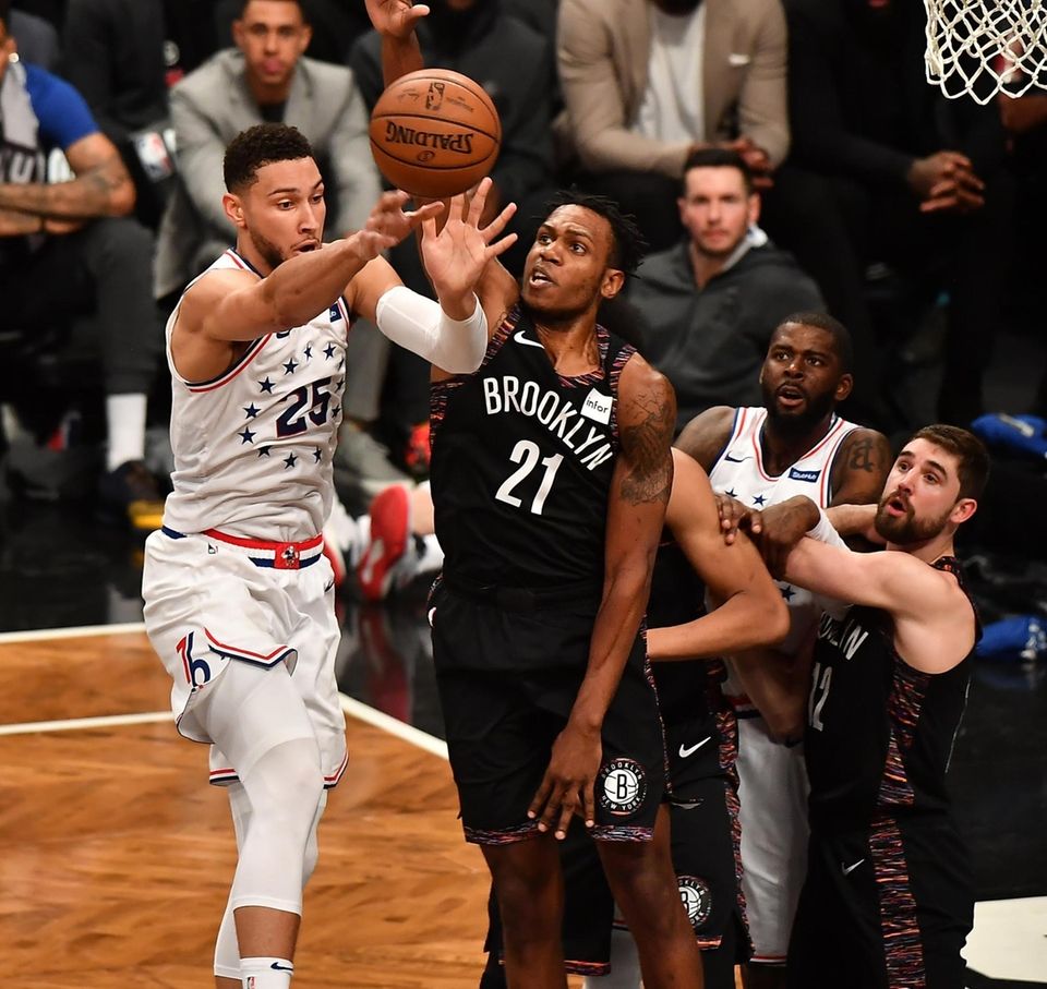 76ers guard Ben Simmons (25) drives on Nets