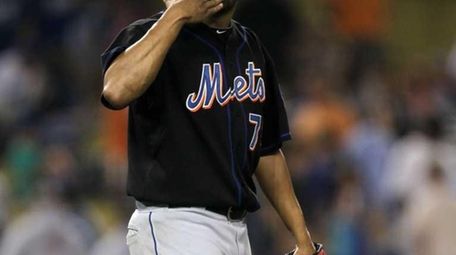 Francisco Rodriguez blows a kiss after picking up