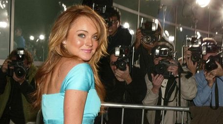LI's Lindsay Lohan arrives for the premiere of