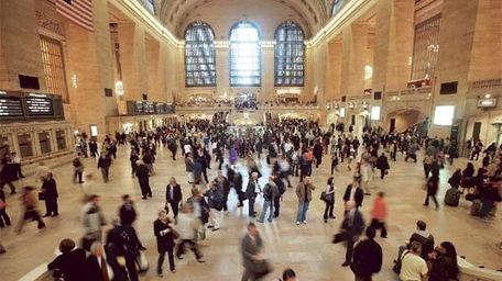 Commuters pass through Grand Central Terminal during the