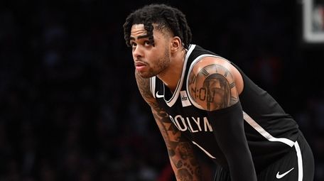 Nets guard D'Angelo Russell looks on against the