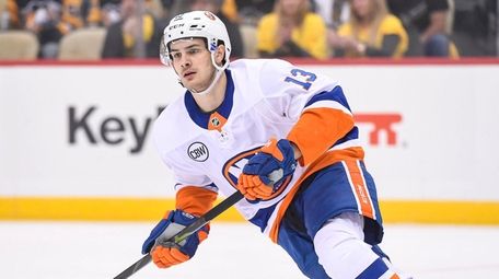 Islanders center Mathew Barzal skates during the first