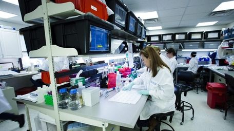 Chembio Diagnostics employees in the company's Medford facility