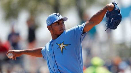 Then-Rays pitcher Wilmer Font works in the first