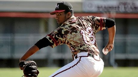 Patchogue-Medford starting pitcher Randall Alejo throws during the