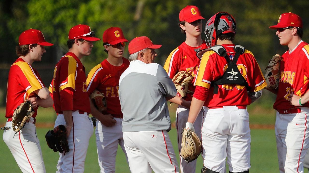 Chaminade coach Mike Pienkos meets with Robert Dahl