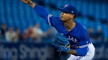 Blue Jays starting pitcher Marcus Stroman works against
