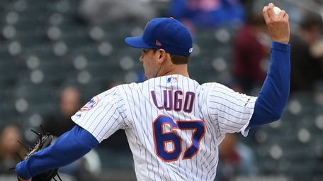 Mets relief pitcher Seth Lugo delivers during the