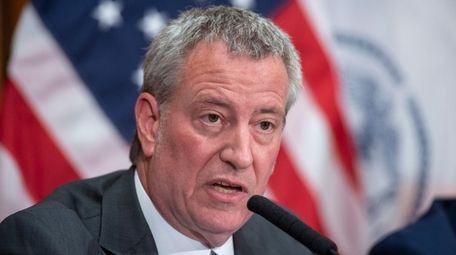 The mayor, speaking at Trump Tower, said the