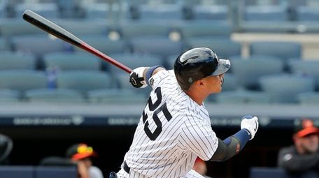 Gleyber Torres #25 of the Yankees follows through