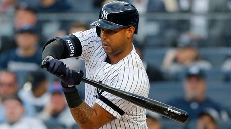 Aaron Hicks of the Yankees bats in first