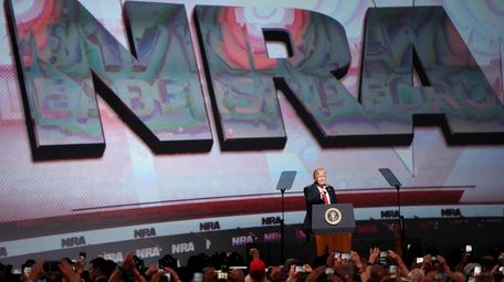 President Donald Trump speaks at the National Rifle