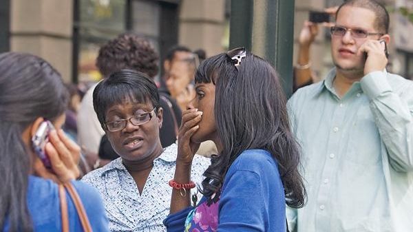 Employees of buildings along West 34th Street call