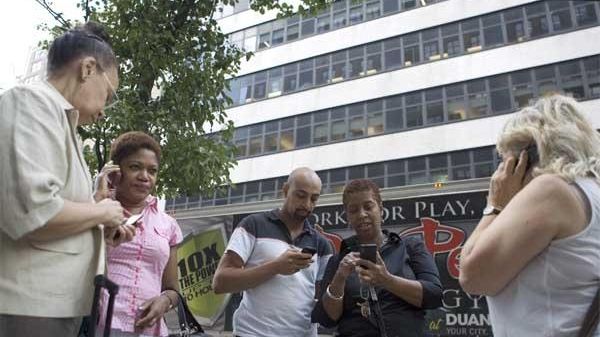 Employees of buildings along West 34th Street call