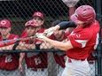 Clarke's Tyler Cox bloops a double to the