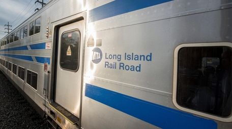 A westbound bi-level Long Island Rail Road commuter
