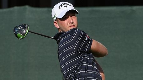 Golfer Daniel Berger tees off during the first