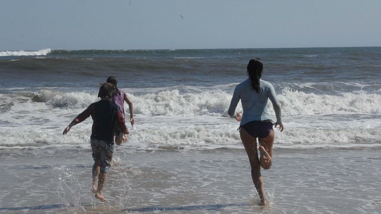Children enjoy a beach day in Southampton after