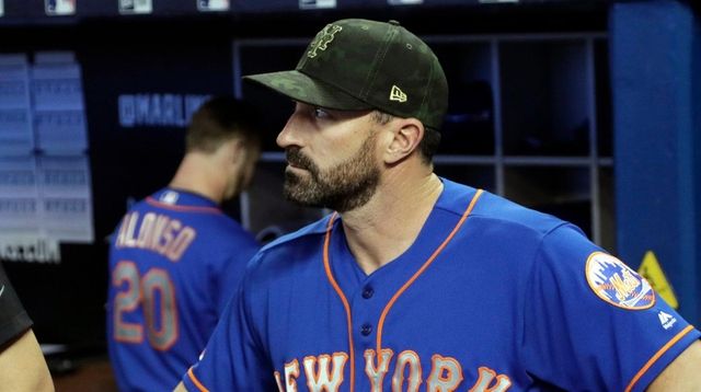 Mets manager Mickey Callaway stands in the dugout... Mets manager Mickey Callaway stands in the dugout