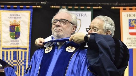 Wolf Blitzer receives an honorary doctorate degree during
