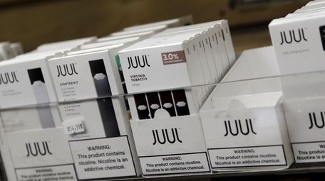Juul products for sale are seen on Dec.
