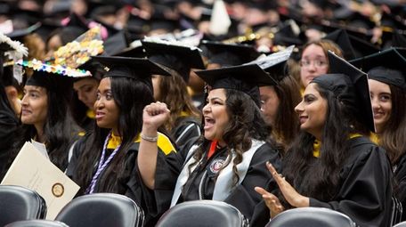 Graduates react as Molloy College President Drew Bogner