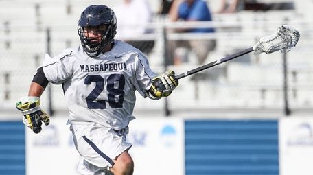 Massapequa's Angelo Petrakis wins another faceoff against Port