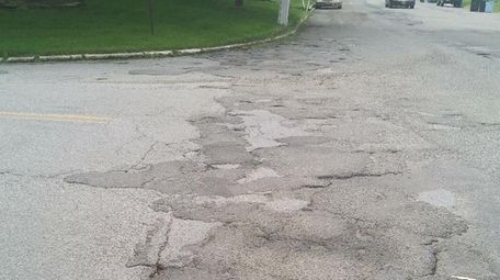 Rutted pavement at Eastwood Boulevard and Hawkins Road