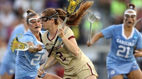 Sam Apuzzo #2 of Boston College Eagles runs