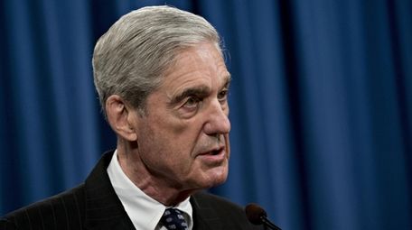 Special Counsel Robert Mueller speaks at the Department