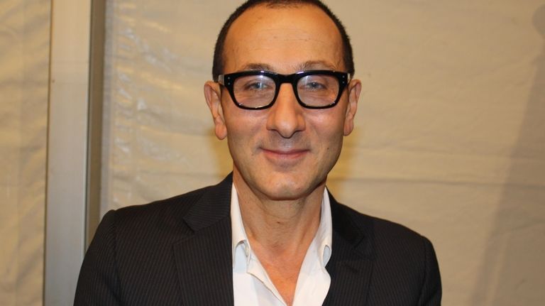Designer Gilles Mendel backstage at his J. Mendel