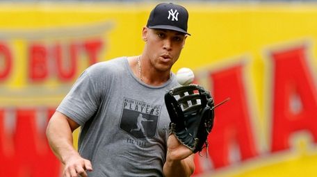 Aaron Judge #99 of the Yankees works out