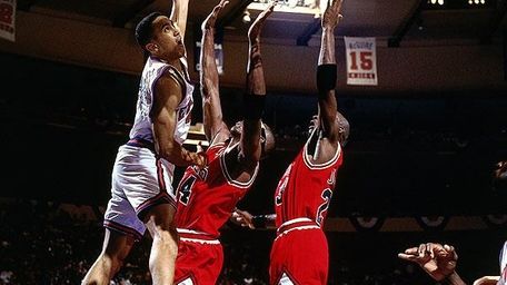 John Starks dunks over Horace Grant and Michael